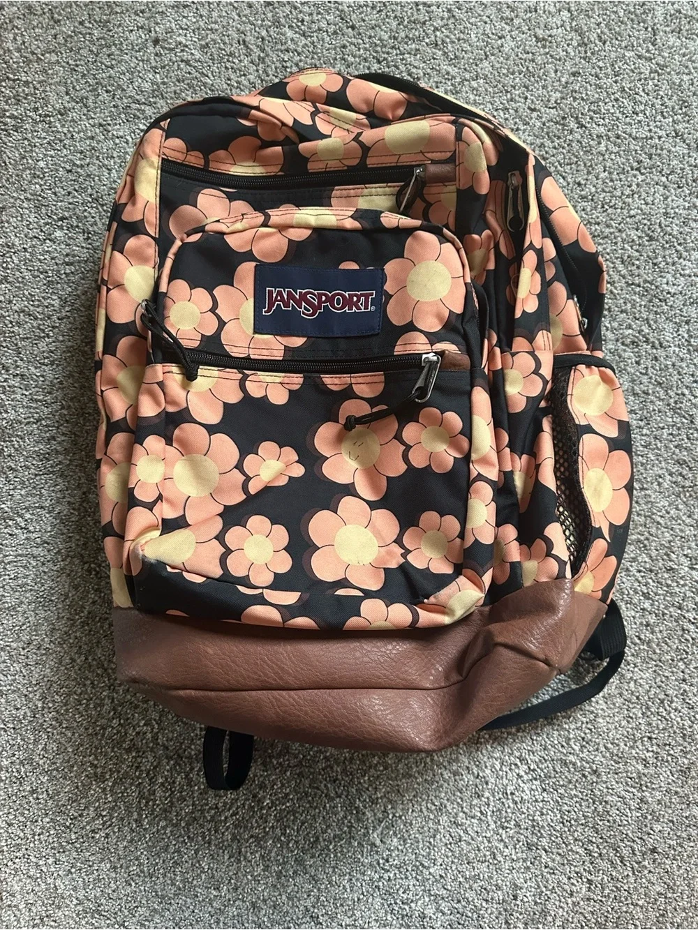 Jansport Black Backpack with Peach & yellow Floral Print