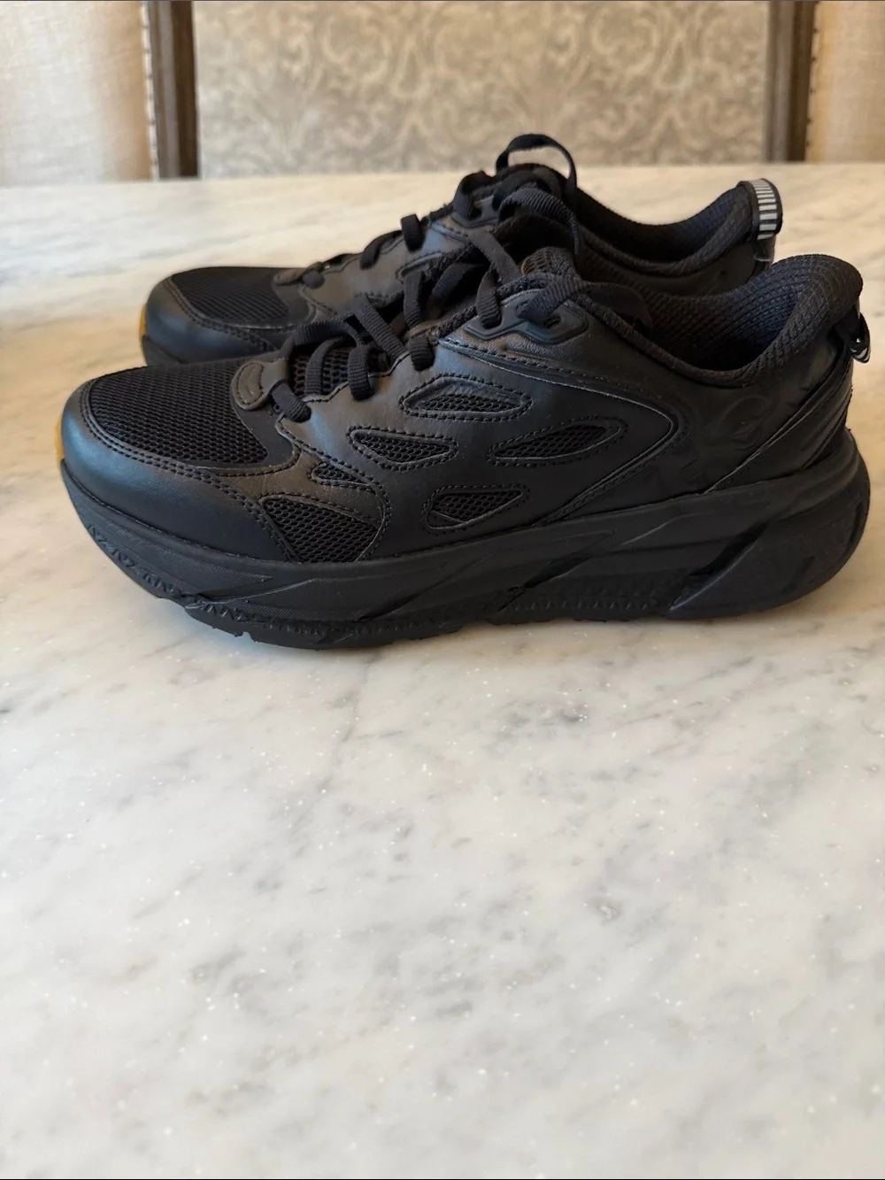 HOKA Unisex Clifton L Leather Mesh Sneakers in Black / Gum Sole