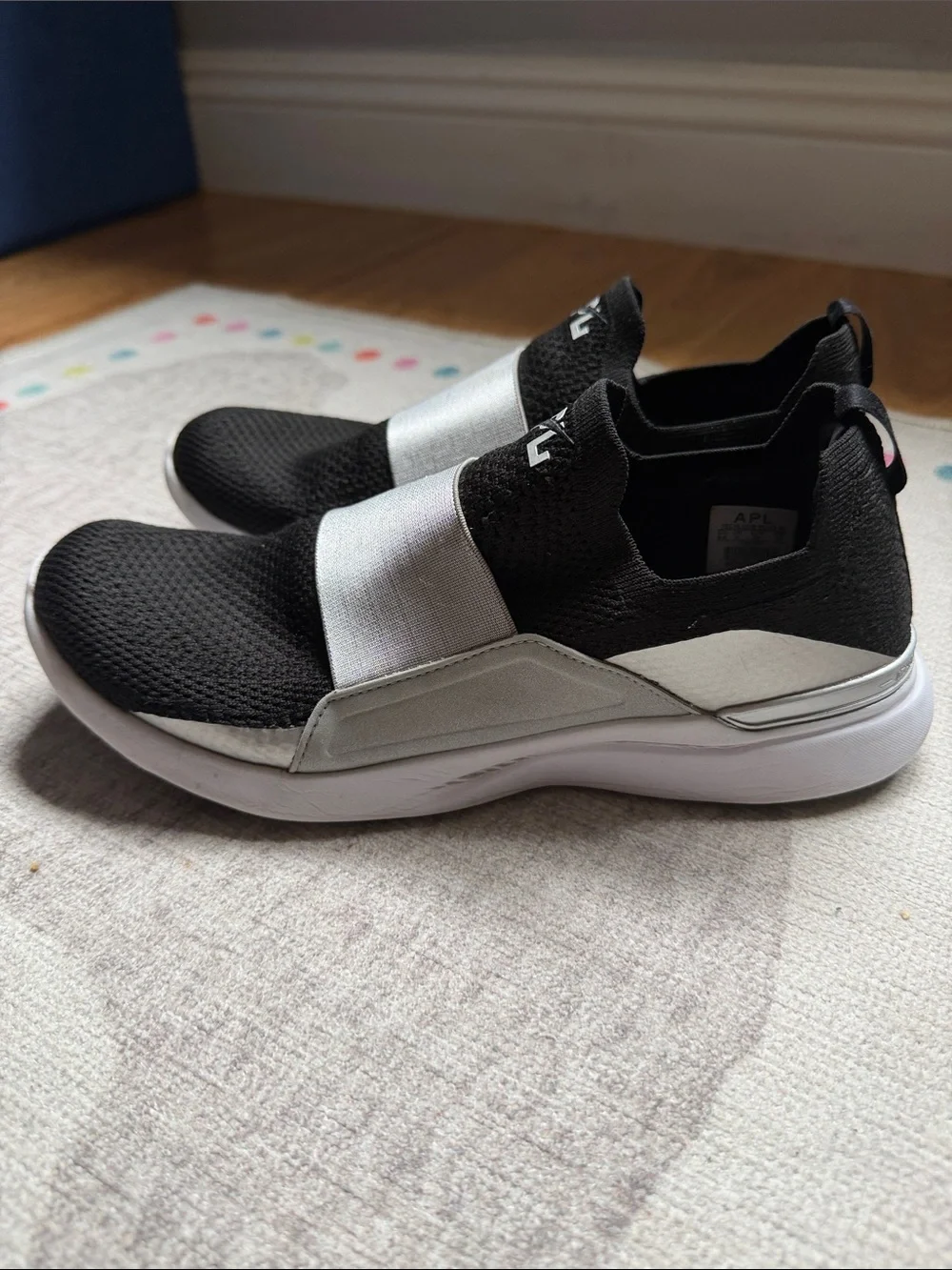 APL Women’s Slip-On Athletic Sneakers in Black and Silver