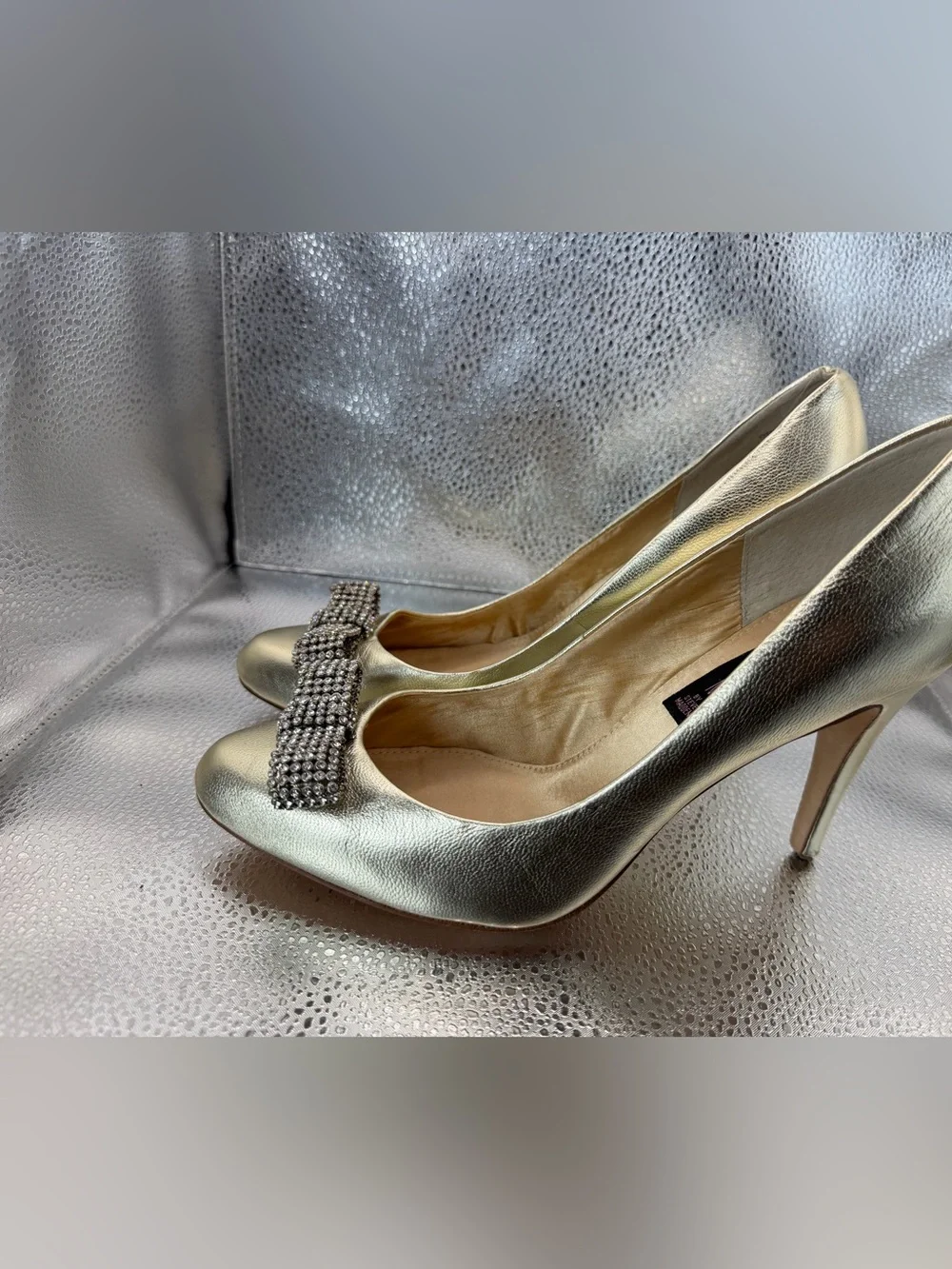 Steven by Steve Madden champagne gold stiletto pumps with rhinestone bow size 9