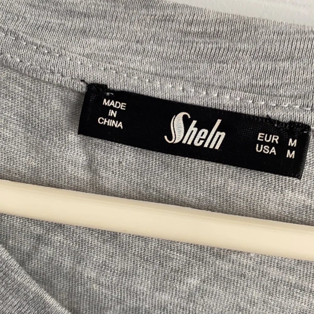 SHELN. WOMENS SHORT SLEEVE SHIRT. SIZE M