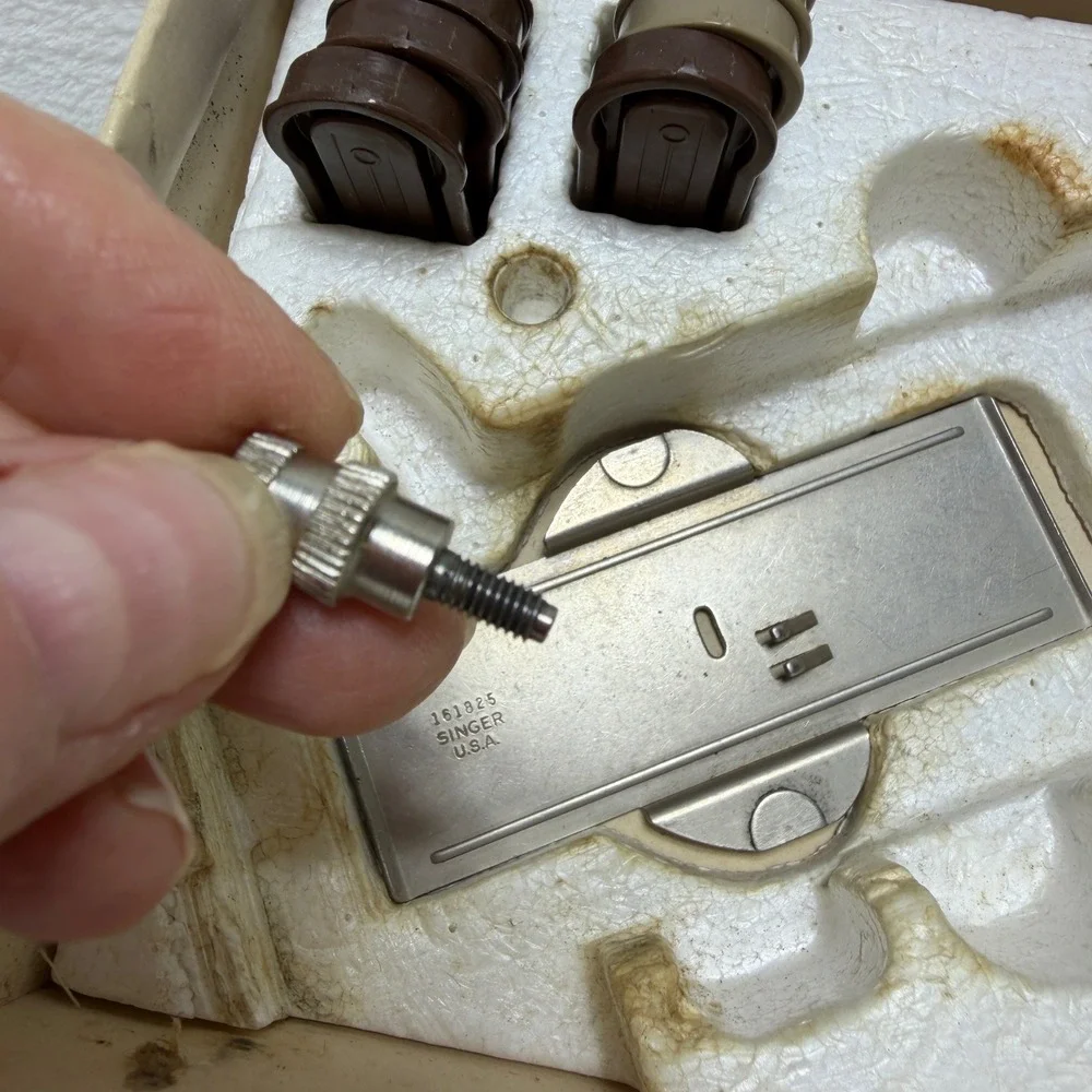 Singer box inside