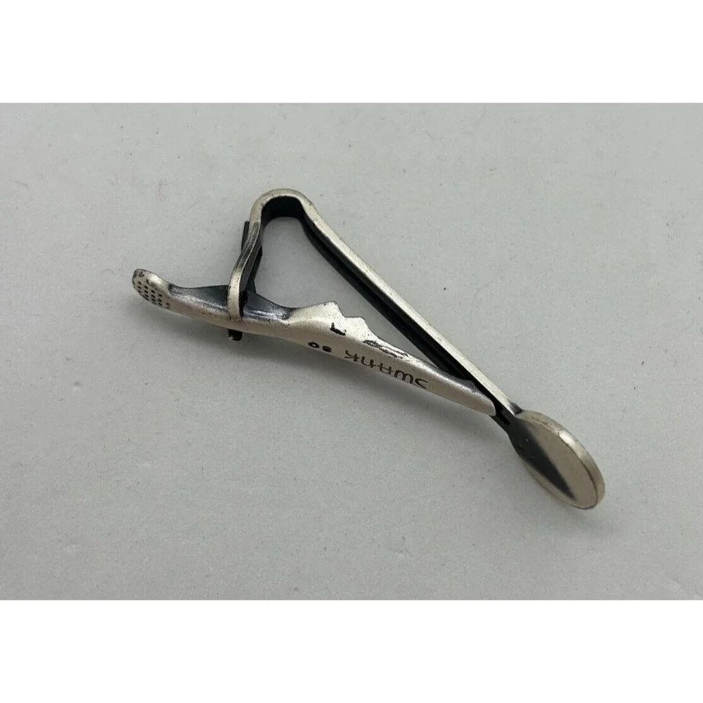 SWANK tie bar