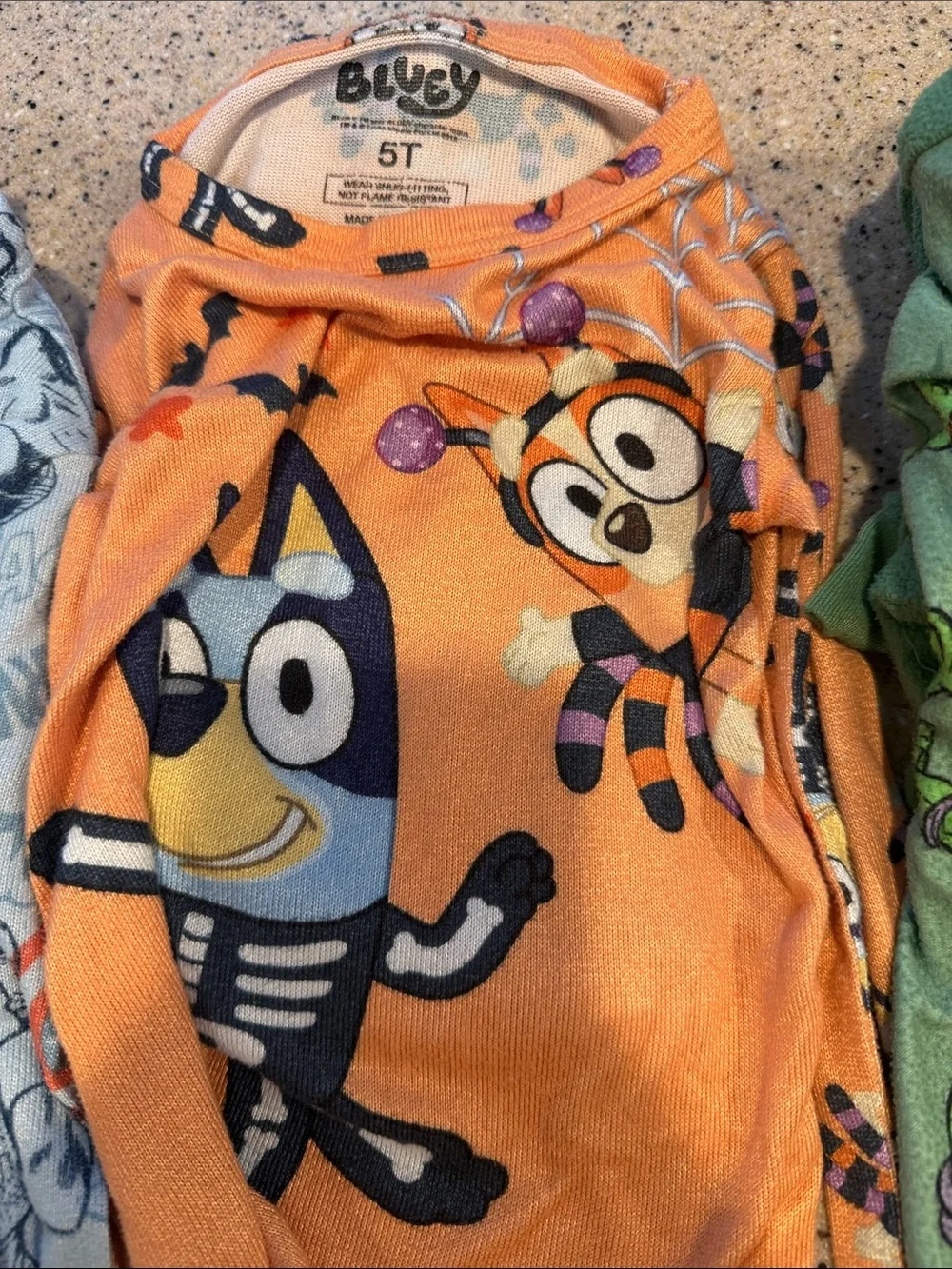 4 sets of kids pjs. Loose fitting 4T and snug fit 5T.