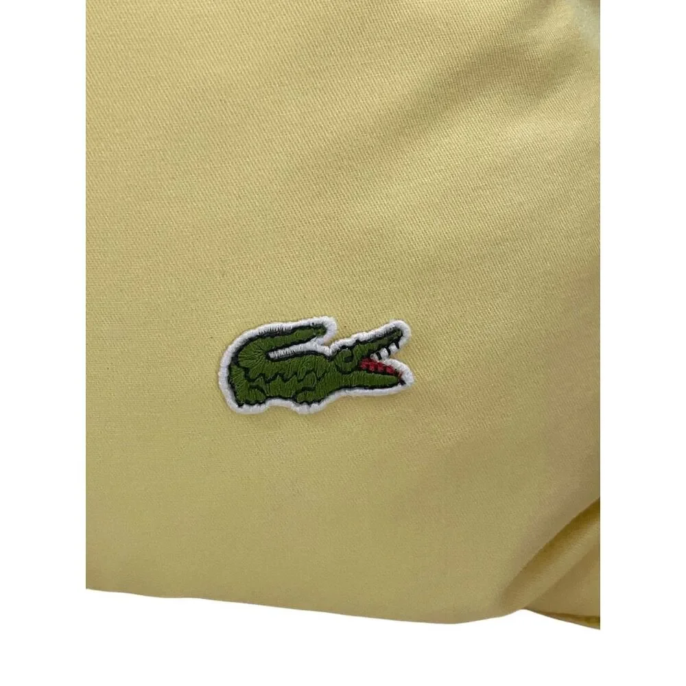 Lacoste yellow button