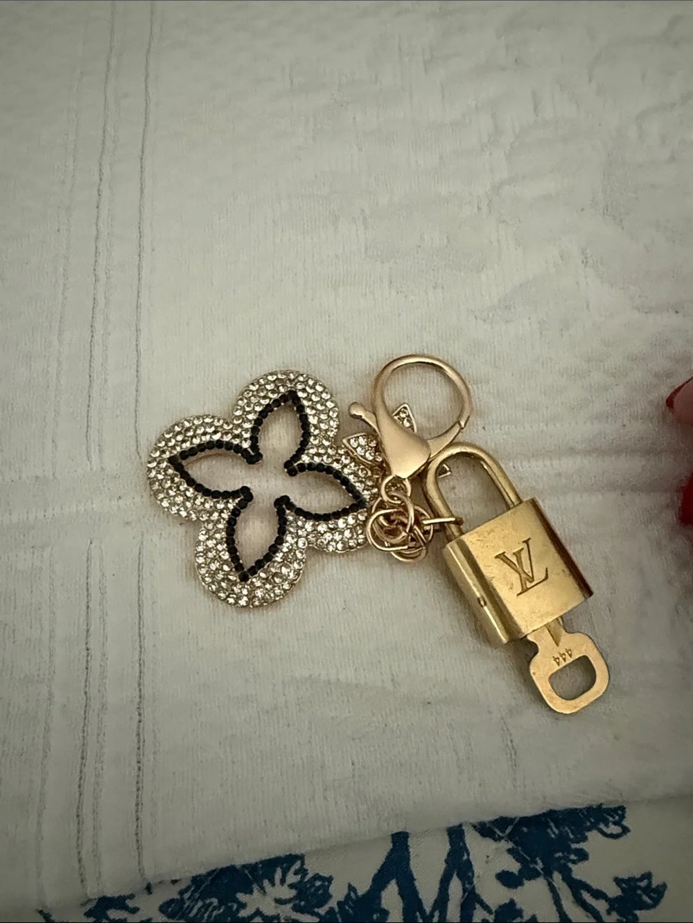 Louis Vuitton lock and key with unbranded gold and White Crystal Flower Charm