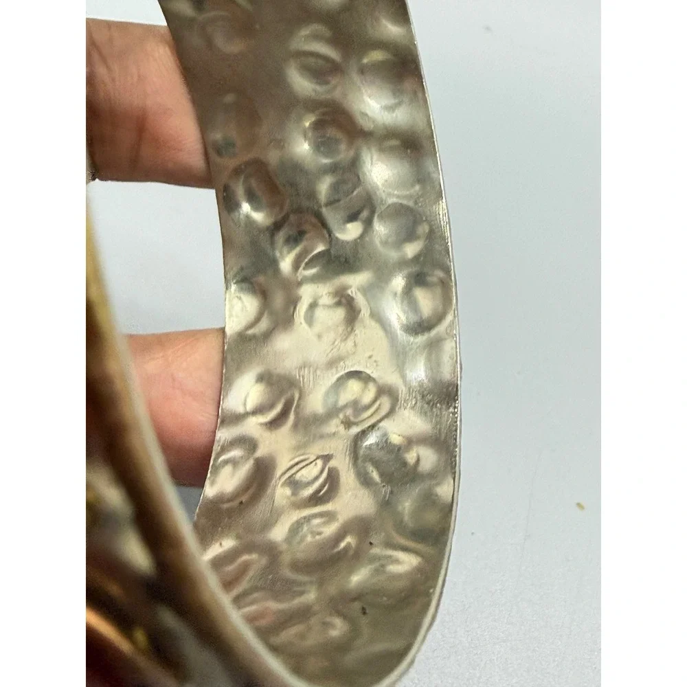 Unbranded hammered silver
