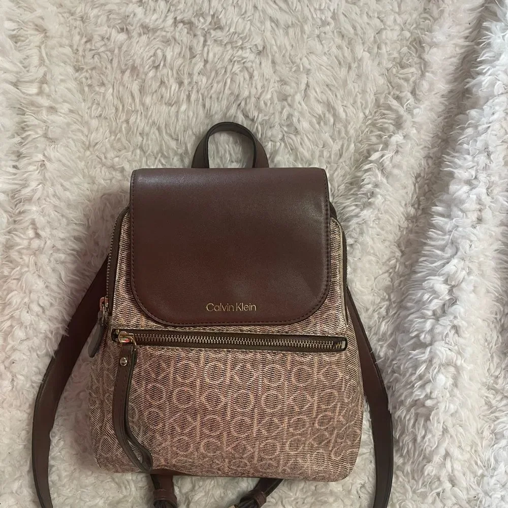 Calvin Klein Tan and Brown Logos  small Backpack logo tone hardwares.