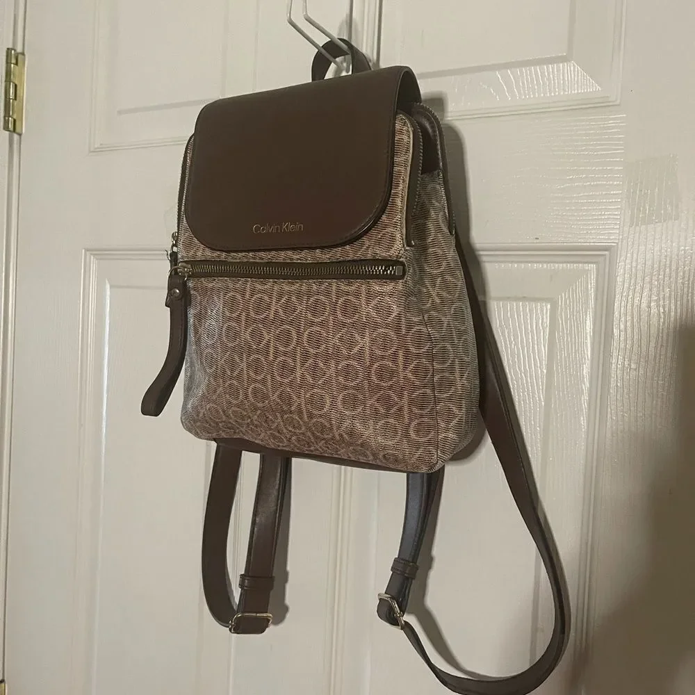 Calvin Klein Tan and Brown Logos  small Backpack logo tone hardwares.