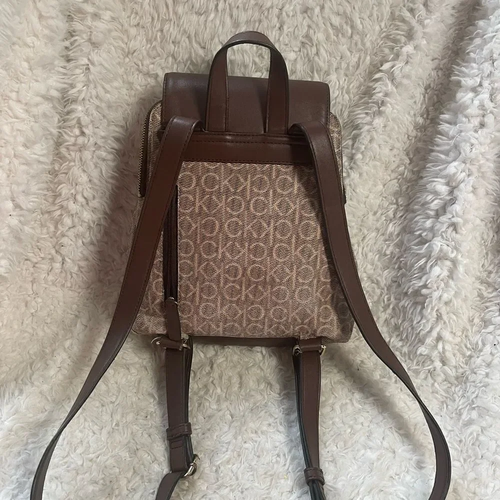 Calvin Klein Tan and Brown Logos  small Backpack logo tone hardwares.