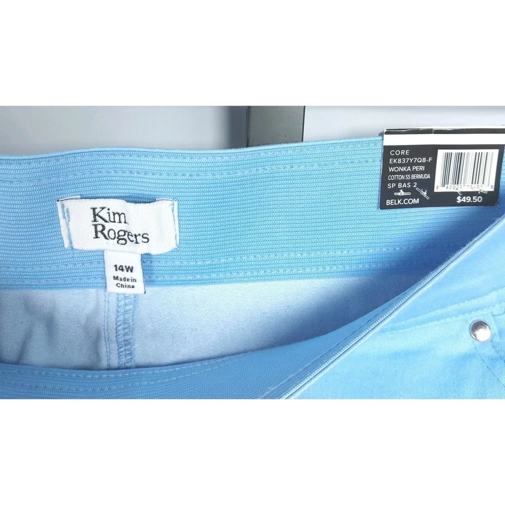 Kim Rogers measures waist