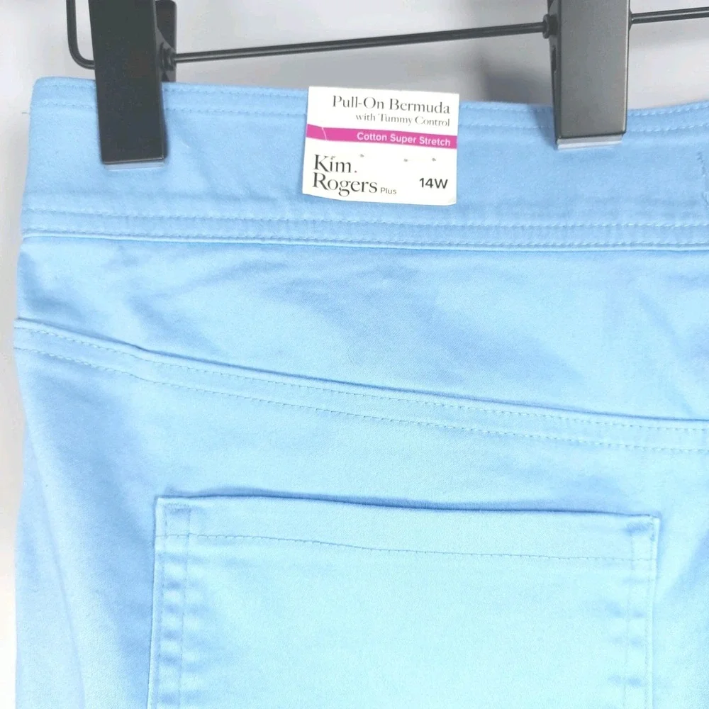 Kim Rogers measures waist