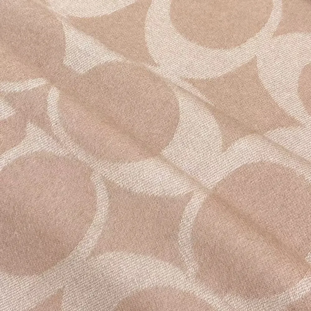 Coach beige logo