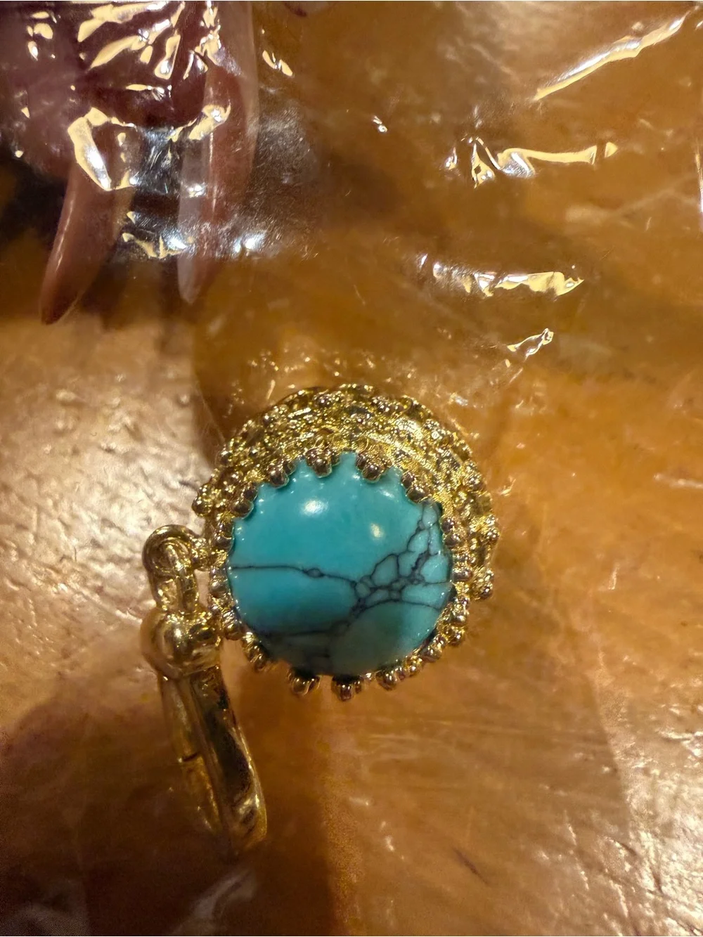 Feed Me Gems blue pendant featuring