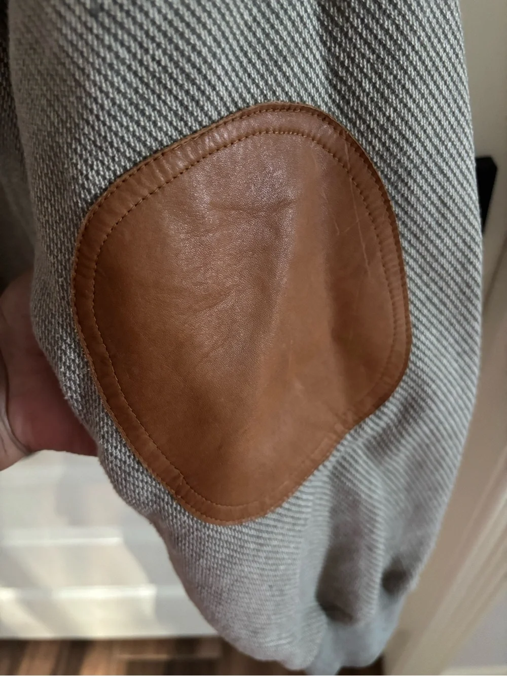 Orvis Men's Light Gray V-Neck Polo Sweater with brown leather elbow patches