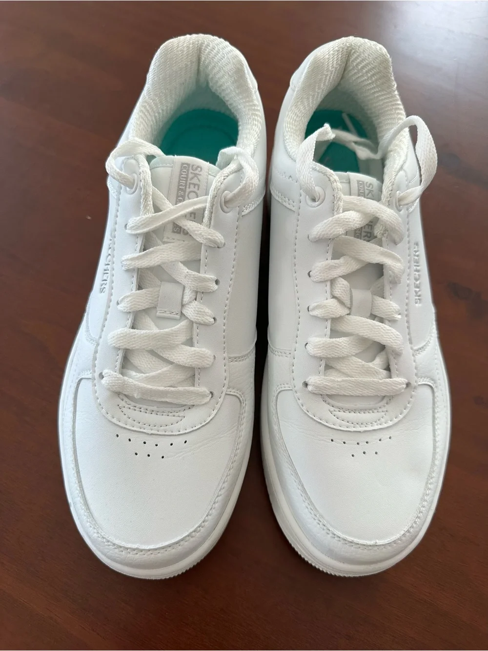 Skechers clean white