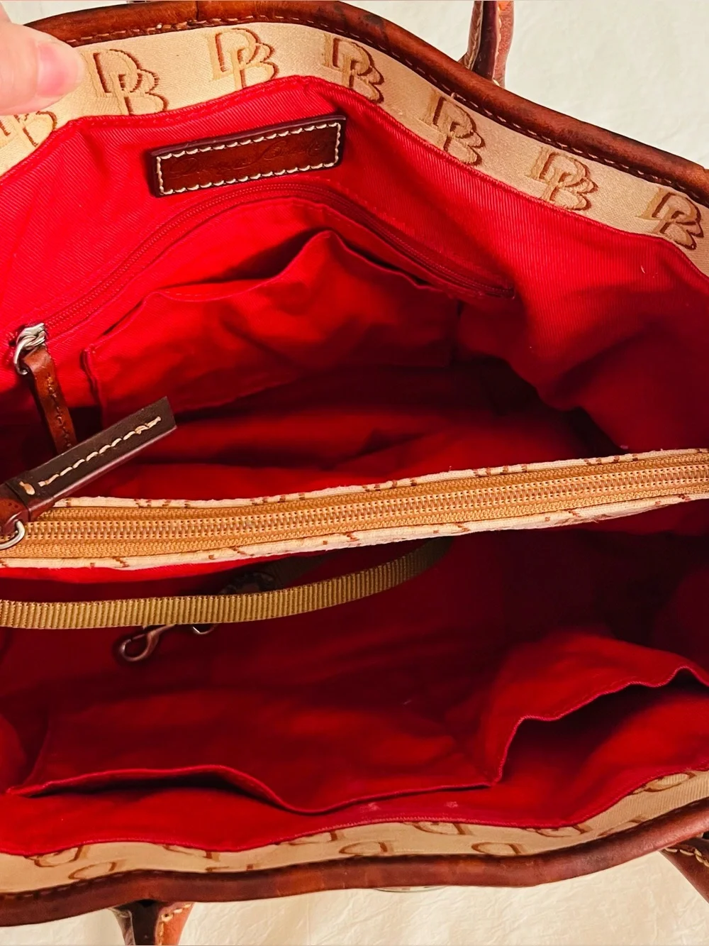 Dooney & Bourke brown adds