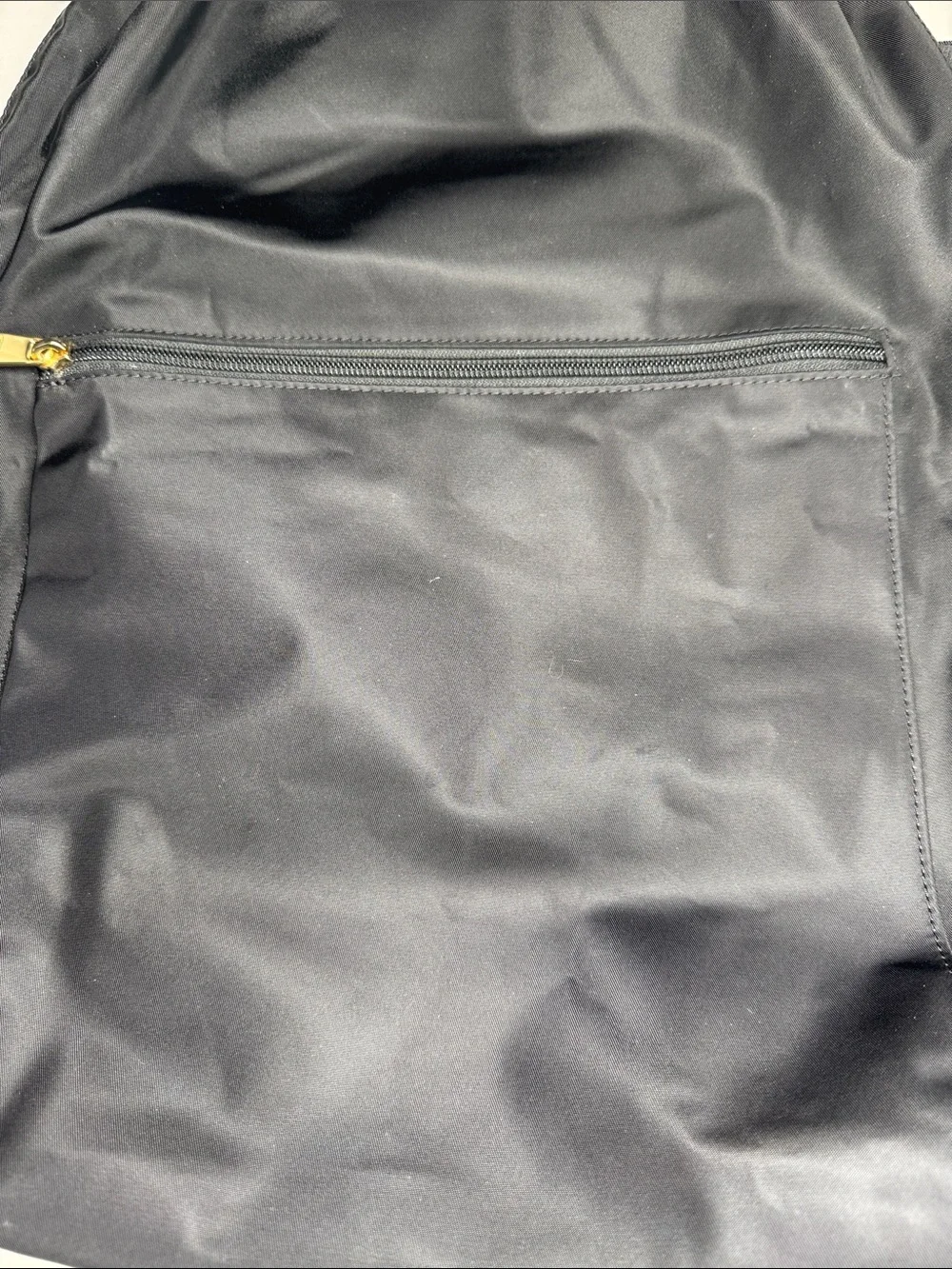 TUMI voyager just in case backpack packable black gold nylon travel neutral