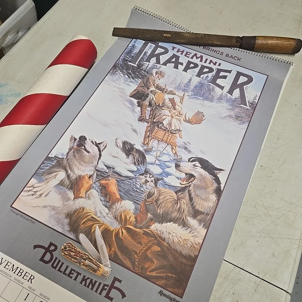1996 Remington Bullet Knife Mini Trapper Calendar 30x20‎