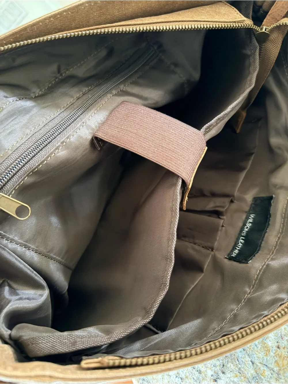 Wilsons Leather flap satchel lock