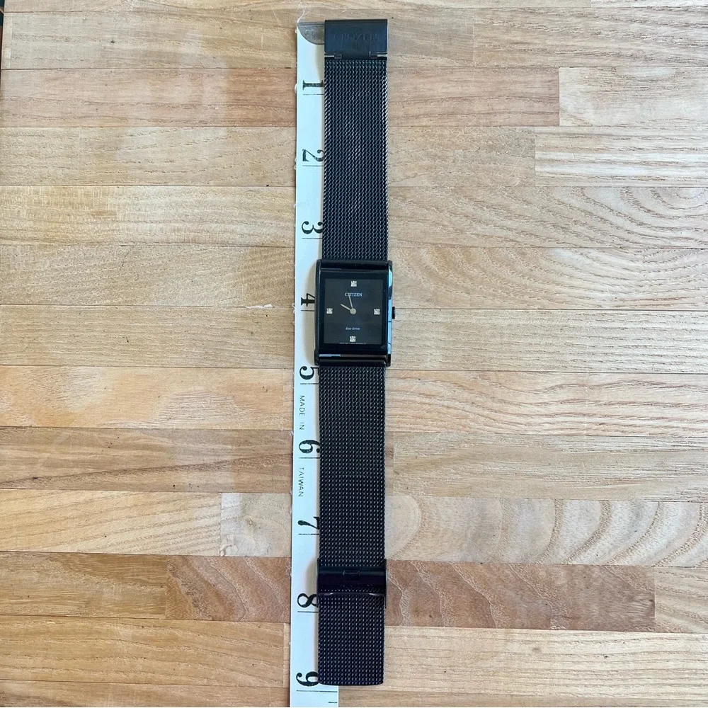 Citizen Eco-drive mens axiom black dial rectangular dress watch