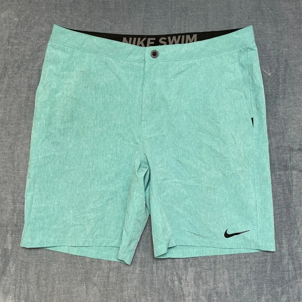 Nike Swim Board Shorts 38 Aqua Green Swoosh Logo Flat Front Slash Pockets Summer
