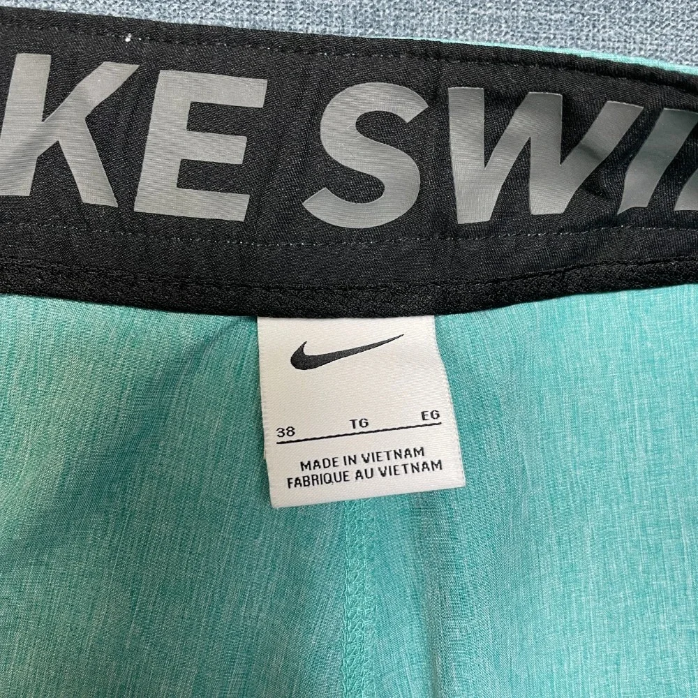 Nike Swim Board Shorts 38 Aqua Green Swoosh Logo Flat Front Slash Pockets Summer
