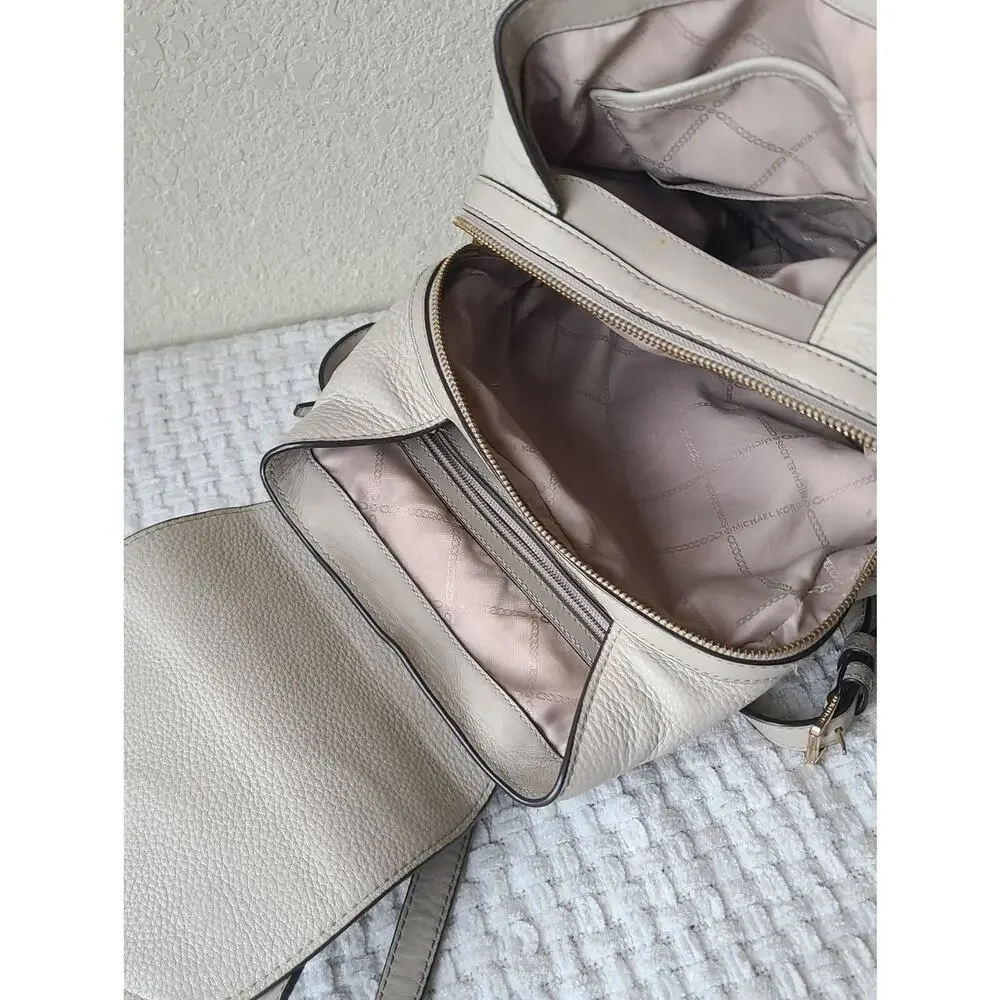 Michael Kors Pebbled Leather Backpack in Light Cream with Gold Hardware