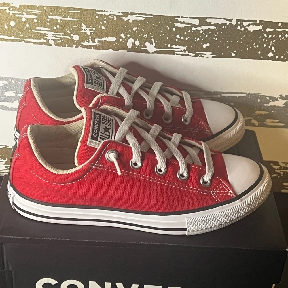 Converse features red laces