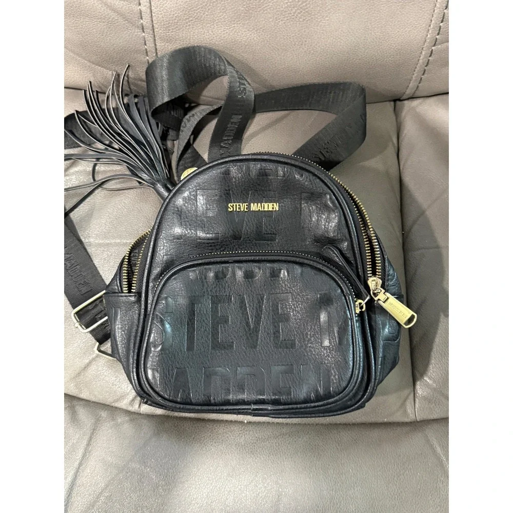 Steve Madden Black Embossed Logo Mini Backpack‎ Convertible Strap Tassel Detail