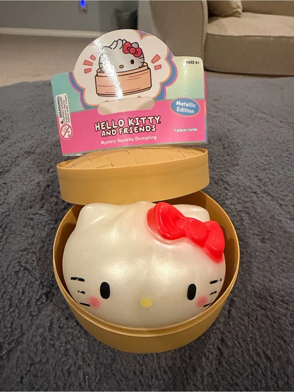 Hello Kitty Metallic Mystery Squishy Dumpling - Pink and Brown