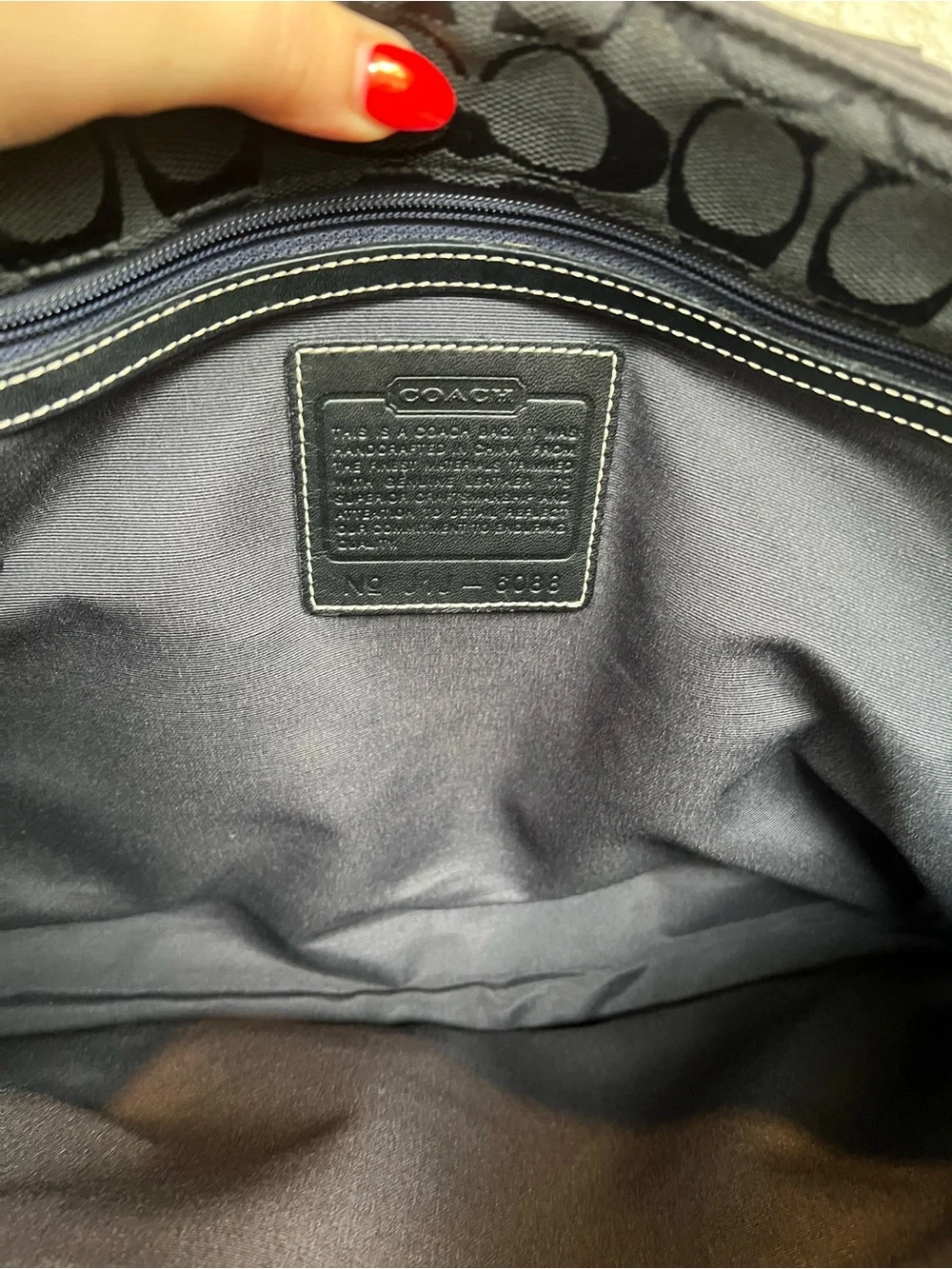 Coach black signature