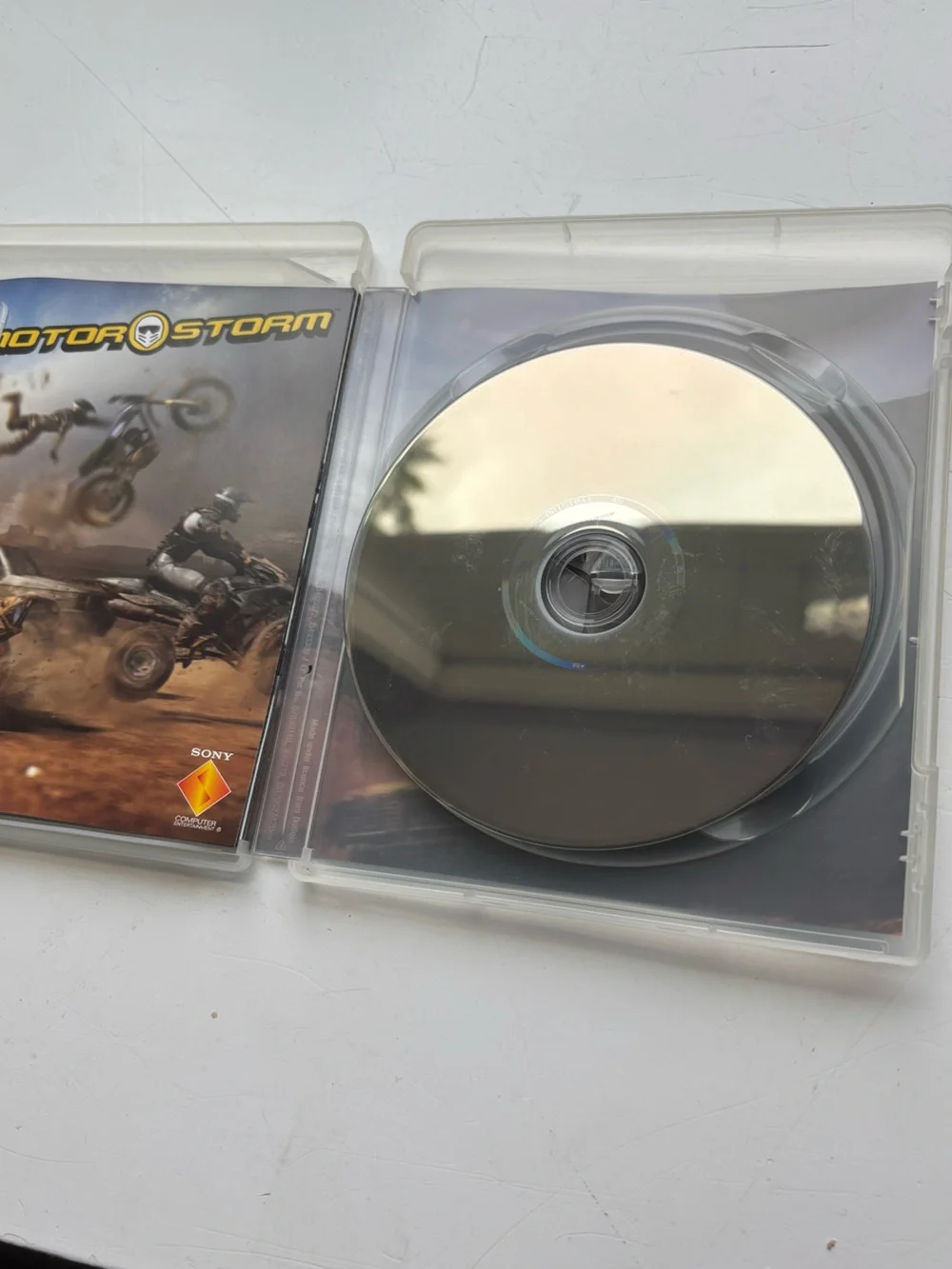 Sony MotorStorm PlayStation 3 Racing Game — White Case with Yellow Logo