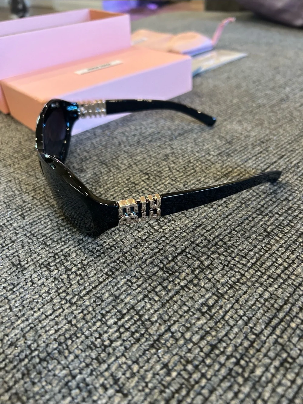 Miu Miu Black Sunglasses with Gold Temple Accents