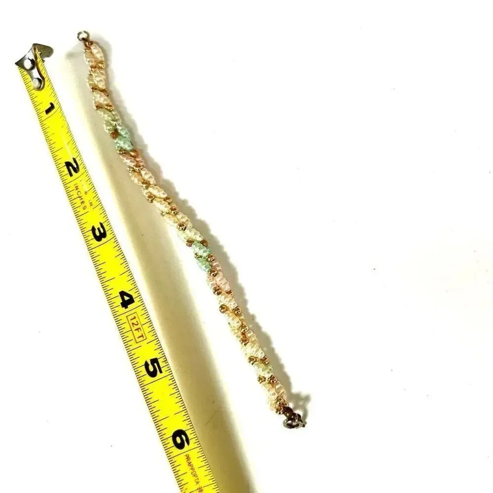 Faux pearl twisted multi strand bracelet